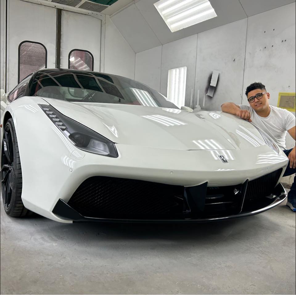Ferrari being serviced at 305 Auto Collision Center — flawless paint finish